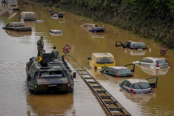 6flooded cars on a road in Erftstadt, Germany, Saturday, July 17, 2021
