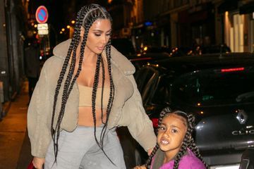 Kim Kardashian assiste au défilé Yeezy avec sa fille North West
