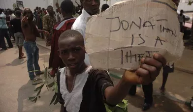 dit la pancarte de cet enfant, en référence au président nigérian, Goodluck Jonathan.