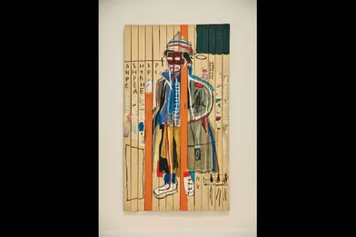 1985, « Anthony Clarke », œuvre majeure, acrylique et collage, peinte sur des lattes de bois assemblées comme une palissade.