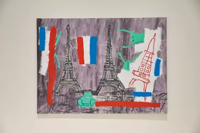 Collaboration avec Andy Warhol pour cette toile de 1985 intitulée « Eiffel Tower ». Les grenouilles, la tour de droite et les drapeaux sont de Basquiat.