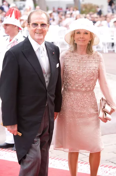 Roger Moore et sa femme, Kristi, en juillet 2011 à Monaco au mariage d'Albert etCharlène Wittstock.