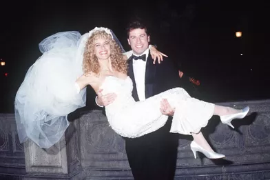 Kelly Preston et John Travolta le jour de leur mariage, le 5 septembre 1991, à l’hôtel Crillon à Paris.