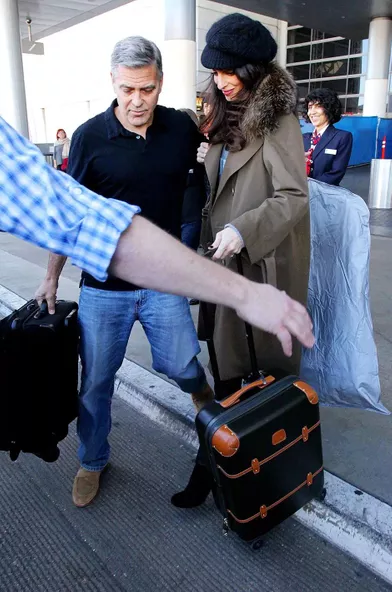 Pour rehausser ce style casual, Amal a opté pour des boots Stella McCartney d'une valeur de 600 dollars.