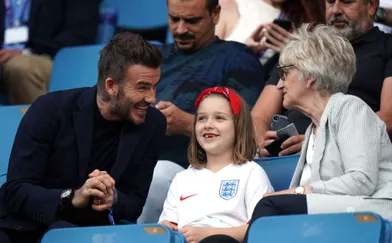 David Beckham, sa fille Harper et sa mère Sandra dans les gradins du match Angleterre-Norvège, le 27 juin 2019.
