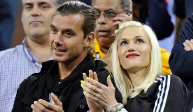 La chanteuse Gwen Stefani et son mari Gavin Rossdale applaudissent la victoire du tennisman Roger Federer contre Jurgen Melzer à l'US Open, hier.