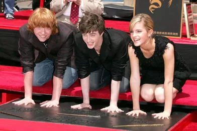 Rupert Grint, Daniel Radcliffe et Emma Watson laissent leurs empreintes à Hollywood en juillet 2007