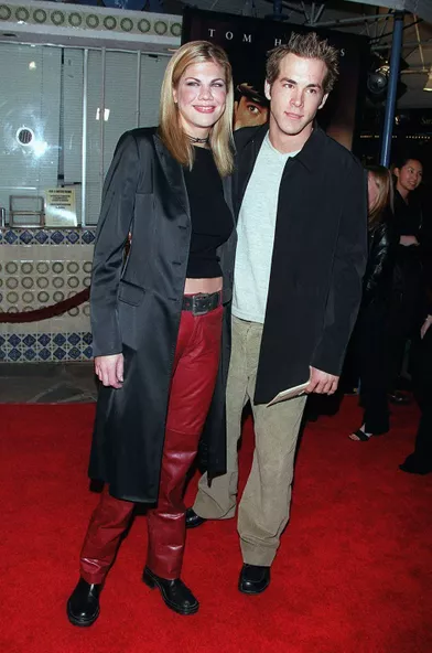 Ryan Reynolds et Kristen Johnston (ici en 1999)