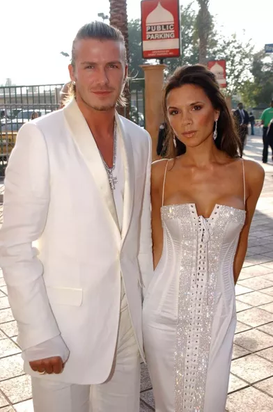 Victoria et David Beckham en 2003. Ils se sont mariés en 1999 et ont eu quatre enfants, Brooklyn, Romeo, Cruz et Harper.