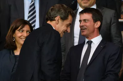 Monica Bellucci, Manuel Valls et Nicolas Sarkozy dans les gradins