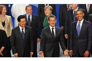  Hu Jintao, Nicolas Sarkozy et Barack Obama ont le sourire.