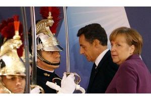  Nicolas Sarkozy et Angela Merkel arrivent au sommet du G20.