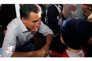  Mitt Romney et un enfant (illustration).
