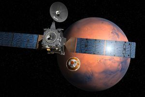 Un satellite devant la planète Mars