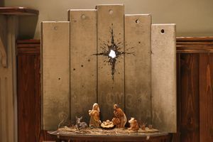 À Bethléem, Banksy expose une crèche de Noël emmurée