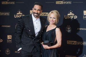 Adil Rami et Pamela Anderson à la cérémonie des Trophées UNPF le 19 mai 2019.