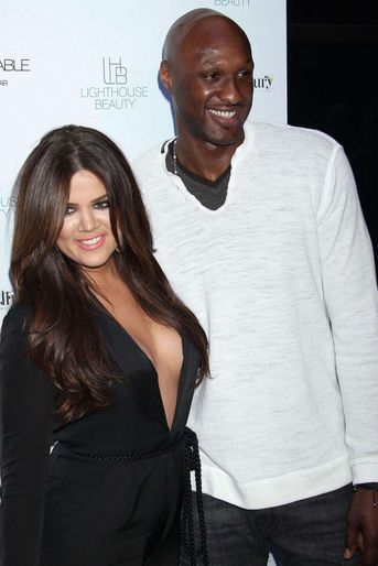 Khloé Kardashian et le basketteur Lamar Odom (ici en avril 2011)