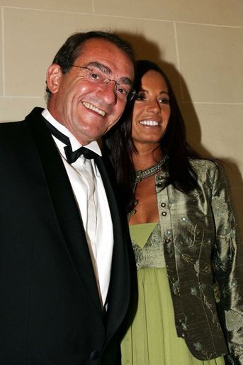 Jean-Pierre Pernaut et Nathalie Marquay lors d&#039;un événement caritatif à Paris en novembre 2005