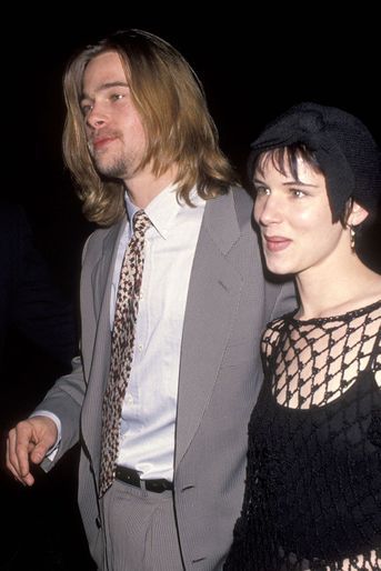 Brad Pitt et Juliette Lewis au salon professionnel ShoWest à Las Vegas en mars 1993