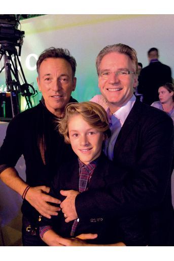 Avec Bruce Springsteen et son fils Benjamin, 11 ans, aux Gucci Masters en 2013.