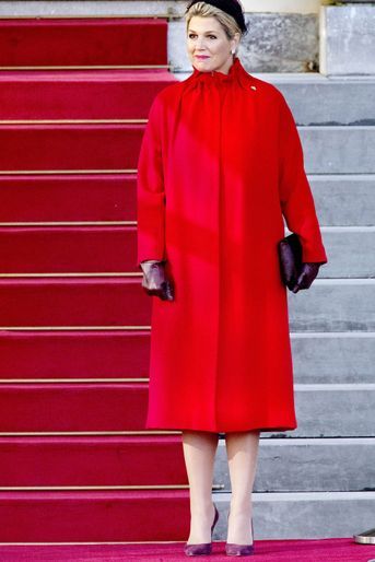 La reine Maxima des Pays-Bas dans un look rouge et aubergine à La Haye, le 29 octobre 2019
