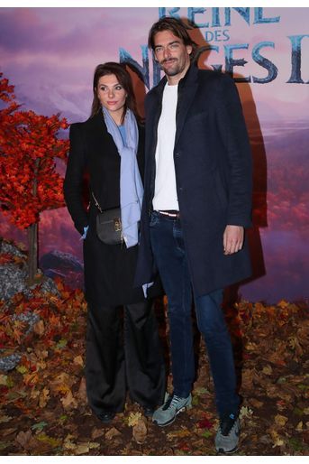 Camille Lacourt et Alice Detollenaere à la première de &quot;La Reine des Neiges 2&quot; au cinéma Le Grand Rex à Paris le 13 novembre 2019. 
