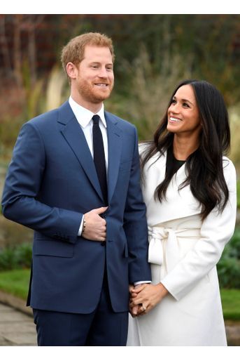 Harry et Meghan annoncent leurs fiançailles dans les jardins de Kensington palace à Londres, le 27 novembre 2017. 