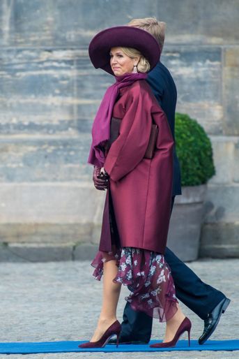 La reine Maxima, en prune, et le roi Willem-Alexander des Pays-Bas, le 21 novembre 2018 à Amsterdam