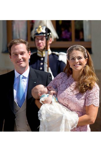 La princesse Madeleine avec son époux Chris, et leur fille Leonore après son baptême à Stockholm, le 8 juin 2014