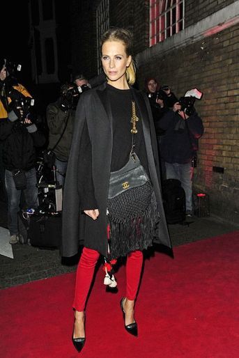 La it-girl Poppy Delevingne lors de la soirée Yves Saint Laurent Beauté à Londres, le 20 janvier 2015