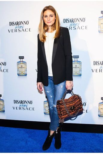 La styliste Olivia Palermo décontractée sur tapis rouge, en jean, pour une soirée privées à New York, le 5 novembre 2014