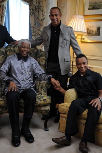 Juin 2008, avec son frère Nic et Nelson Mandela