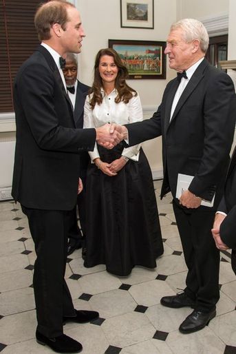 Le prince William avec Paddy Ashdown, Melinda Gates et Kofi Annan à Londres, le 21 novembre 2014