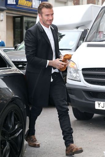 David Beckham lors de l'ouverture de la boutique londonienne de Victoria Beckham ce 25 septembre 2014.