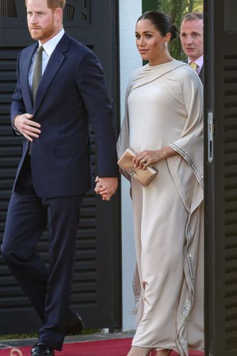 Le prince Harry et Meghan Markle assistent à une réception organisée par l'ambassadeur britannique au Maroc, Thomas Reilly, à la résidence britannique de Rabat, le 24 février 2019