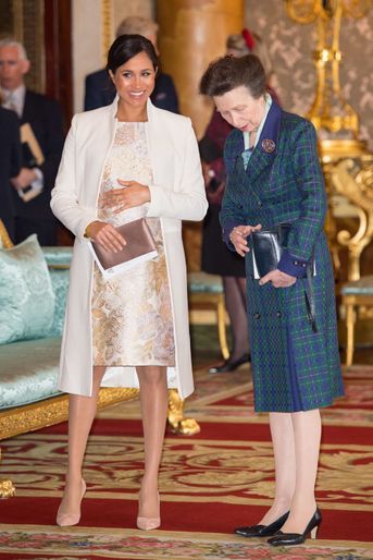 Meghan Markle et la princesse Anne à la réception tenue pour les 50 ans de l’investiture du prince de Galles au palais de Buckingham le 5 mars 2019