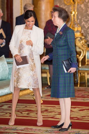 Meghan Markle et la princesse Anne à la réception tenue pour les 50 ans de l’investiture du prince de Galles au palais de Buckingham le 5 mars 2019