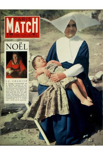 Couverture du Paris Match n°505 du 13 décembre 1958 : Soeur de Saint-Vincent-de-Paul portant dans ses bras un petit enfant palestinien abandonné à Jerusalem.