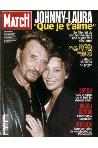 Johnny Hallyday et sa fille Laura en couverture de Paris Match