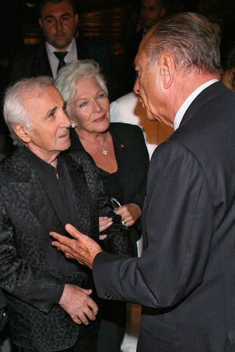 Charles Aznavour et Line Renaud face à Jacques Chirac, en septembre 2006.