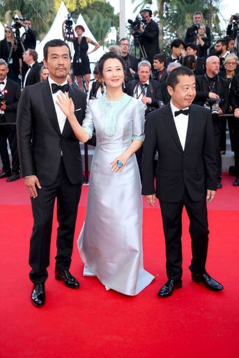 Fan Liao, Zhao Tao et Jia Zhang-ke montent les marches à Cannes le 11 mai 2018