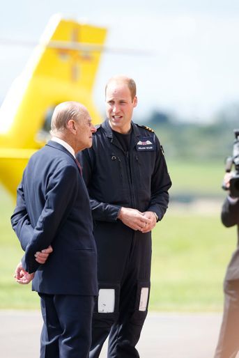 Le prince Philip avec son petit-fils le prince William à Cambridge, le 13 juillet 2016