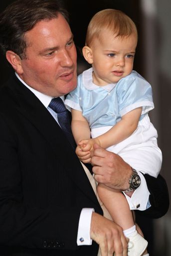 Le prince Nicolas de Suède avec son papa Christopher O'Neill au baptême du prince Oscar à Stockholm, le 27 mai 2016
