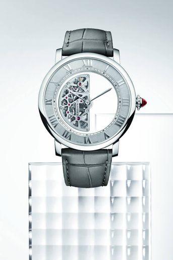 CARTIER Huit ans de développement pour cette montre automatique Masse Mystérieuse. 300 000 euros.