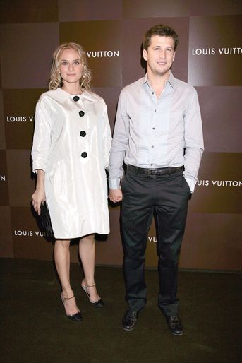 Diane Kruger et Guillaume Canet lors d'une soirée organisée par Louis Vuitton à Paris en 2005. 