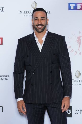 Adil Rami au gala de l'association «Les Bonnes Fées», à l'InterContinental Paris Le Grand, le 14 juin 2022.