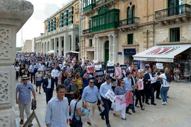 La marche des journalistes à La Valette, le 19 octobre. Sur leurs pancartes : « Même pas peur ».