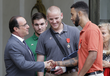 Les trois héros du Talys reçus à l'Elysée par François Hollande, le 24 août 2015.