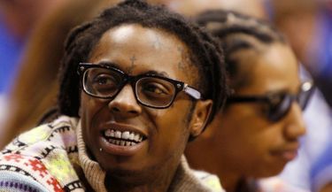2-photos-people-musique-Lil Wayne--Lil Wayne montre son beau sourire