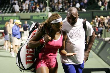 Avec son père, Richard, en 2005, après un match perdu contre sa soeur Venus.